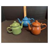 Three small enamel individual serving teapots