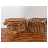 Two very intricate pine needle purses