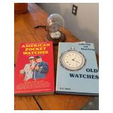 Pair of Westclox pocket watches in dome and reference books