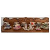 Nine cups w saucers, S&P set w tray