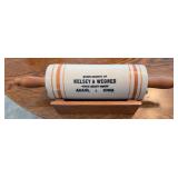 Stoneware rolling pin with rest “Compliments of Kelsey & Wegner Where Quality Counts Adair Iowa”