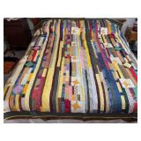 Machine stitched and custom quilted measures 79x95