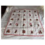 Machine stitched and custom quilted measures 40x42