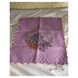 Machine stitched and custom quilted measures 27x34 Hand embroidered