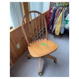 Spindle back chair on wheels, adjustable height