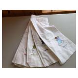 Machine embroidered days of the week towels as shown