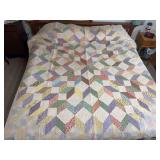 Machine stitched and custom quilted 83x84 “Carpenters Star Extended”