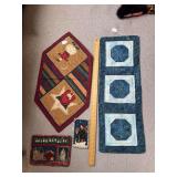 Two centerpieces and trivets, machine stitched