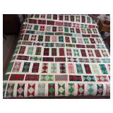Machine stitched and custom quilted 81x89