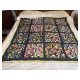 Machine stitched and custom quilted measures 60x62 Minky back