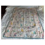 Machine stitched and custom quilted measures 41x50 Chenille and waffle weave back