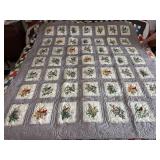 Machine stitched and custom quilted measures 62x74