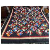 Machine stitched and custom quilted measures 72x84