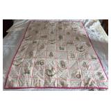 Machine stitched and custom quilted measures 42x54