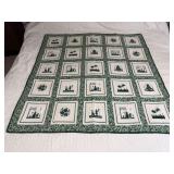 Machine stitched and custom quilted measures 49x51