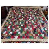 Machine stitched and custom quilted measures 70x74