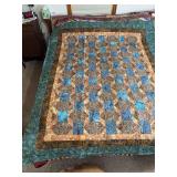 Machine stitched and custom quilted 72x95