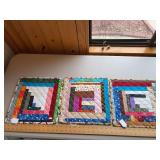 Three large trivets as shown