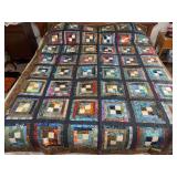 Machine stitched and custom quilted measures 72x95