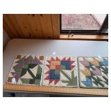 Three large trivets as shown