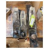 Three wood planes Stanley bedrock 605 1/2, Stanley bedrock number 604, and Bailey number seven