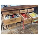 Six drawer contents and workbench, mostly nuts and bolts and hardware, chalk line, electrical