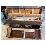 Carpenters toolbox with assortment of tools