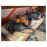 Shelf full of corded power tools, Sanders, grinders, drill, saws
