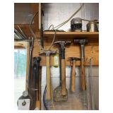 Nippers, crowbar, hammers, oil can, wire reel, and small oil burner