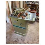 Powermatic shaper tool with lots of bit attachments