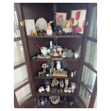Contents of China cupboard includes knickknacks, China, glassware, figurines