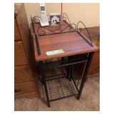 Two small matching metal leg side tables