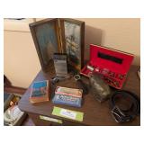 Gentlemen’s dresser type items includes marine band harmonica, dresser box, Bank, belt, watches