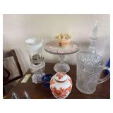 Footed glass cake plate, antique milk glass hobnail vase, antique oil finger lamp, and other glassware pieces