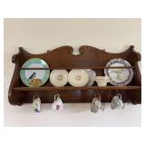 Antique wall hanging quartersawn oak plate and cup display rack with China plates and cups