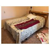 Queen size bed with bookshelf storage style headboard