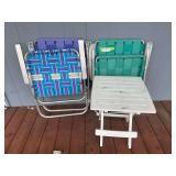Webbed lawn chairs and small table