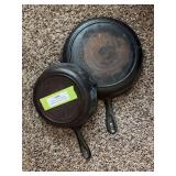Two cast iron skillets - made in USA no. 5 no. 8