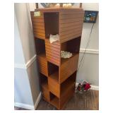 Swivel cubby style display shelf, 16 in.² by 51 tall