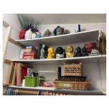 Miscellaneous home decor items, including lots of Buddah figurines, some games, baskets, and more