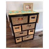 Small basket storage rack with eight baskets 22 x 32 x 15 includes some household care items