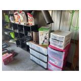 Four shelving units with miscellaneous yard and garden care items, including bug and weed killer, hand tools, hose and sprinkler attachments, hand sprayers, hand tools, painting supplies
