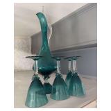 Vintage blue wine carafe and four glasses made in Italy