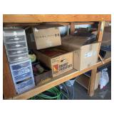 Lower shelf of craft items includes jewelry making items, canvas, wood-burning