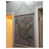 All art in the hallway includes black-and-white florals, inspirational, framed flour sack, hanging map