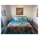 Queen sized bed with mattress and boxspring plus 2 glass top side tables, pair of modern looking lamps and bedroom artwork