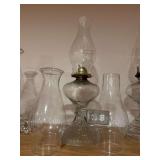 Large kerosene lamp and extra chimneys