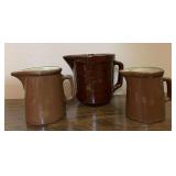 Three pottery pitchers-Weller and USA marked