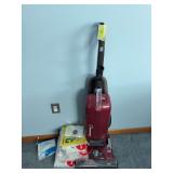 Hoover Wind Tunnel vacuum and lots of bags