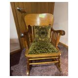 Antique oak arm rocker